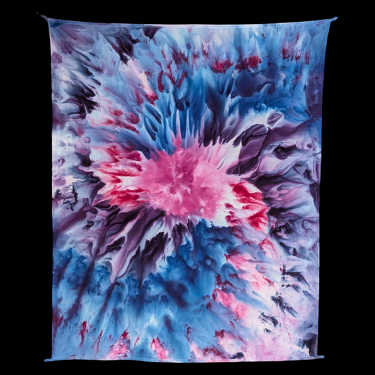 Tie-dye pattern with pink, blue, and black colors on a black background